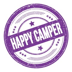 HAPPY CAMPER text on violet indigo round grungy stamp.