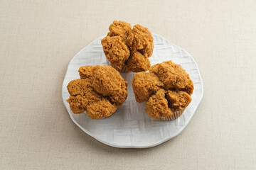 Bolu Kukus Gula Jawa (brown sugar steamed sponge cake), a traditional snack from Indonesia made from flour, egg, brown sugar, and salt. 
