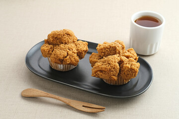 Bolu Kukus Gula Jawa (brown sugar steamed sponge cake), a traditional snack from Indonesia made from flour, egg, brown sugar, and salt. 
