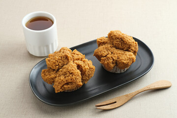 Bolu Kukus Gula Jawa (brown sugar steamed sponge cake), a traditional snack from Indonesia made from flour, egg, brown sugar, and salt. 
