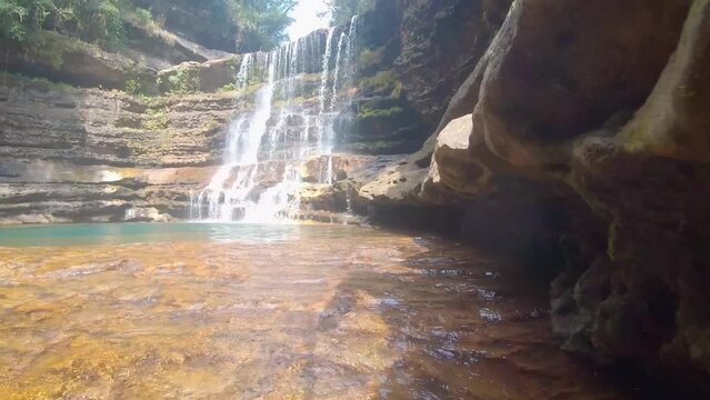 natural waterfall clear white streams falling from rocks from different perspective