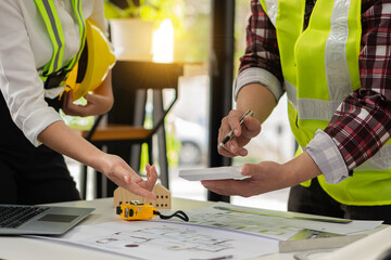 2 construction site engineers On-site engineering objects work with interactive partners and behind...