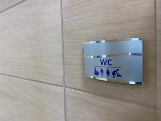 Toilet icons set. WC signs for restroom. Restroom sign on a toilet wall,on modern background.Toilet signs - Restroom Concept