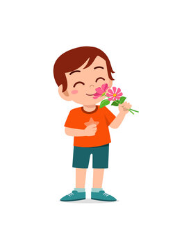 little boy holding flower and sniff the scent