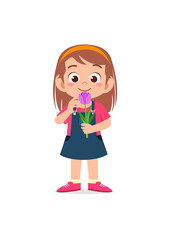 little girl holding flower and sniff the scent