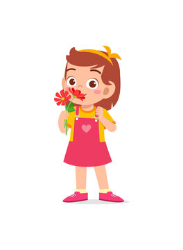 little girl holding flower and sniff the scent