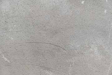 Rough grey plaster, unfinished wall. Textured wall background