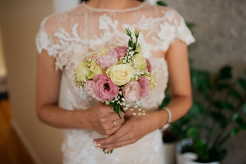 Bride with bouqet. Love lives in the smallest of details.