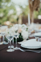 Wedding. Birthday. Reception. Decoration, chairs, tables and flowers.