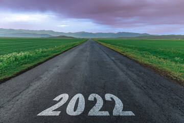 2022 text on asphalt road