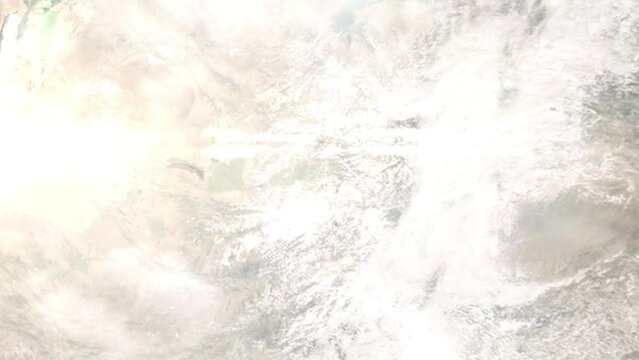 Earth zoom in from outer space to city. Zooming on Osh, Kyrgyzstan. The animation continues by zoom out through clouds and atmosphere into space. Images from NASA