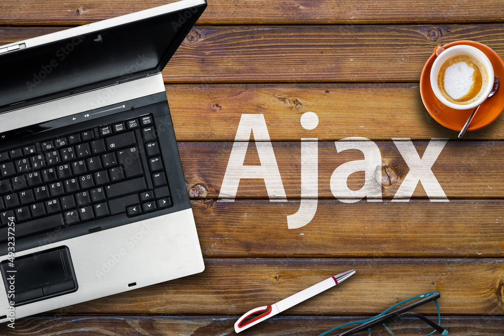 Aufkleber ajax programming language. word ajaxand laptop, glasses and coffee on wooden table