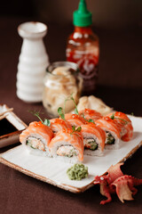 Red dragon sushi with caviar and avocado