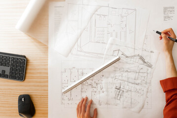 Top view of architect drawing on architectural project