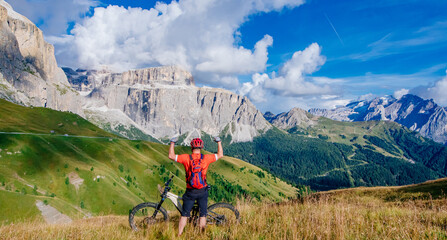 Dolomites by mountain bike, beautiful space, views and bicycle paths, Adventure and journey that gives joy and happiness - obrazy, fototapety, plakaty
