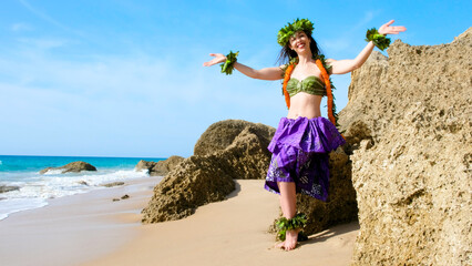 Smiling woman receives waving hand. Exotic beauty. Hawaiian typical costume.