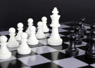 Brainstorming business strategy chess board game. business leader concept.