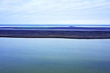 steppe plain landscape lake in the middle of fields