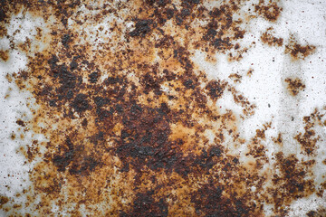Rusty metal wall, old iron sheet covered with rust