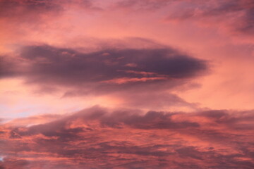 a red cloudy sky after sunset