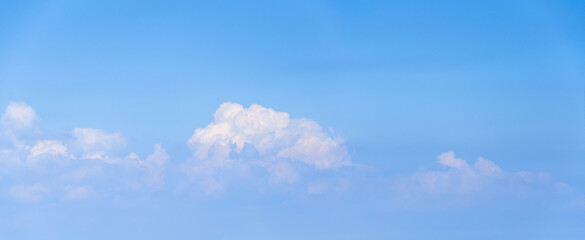 Panorama of blue sky with white cumulus clouds