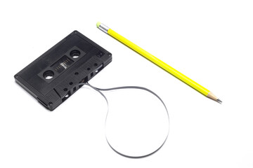 A pen for rewind cassette tape compact retro on white background. 90's concepts.	