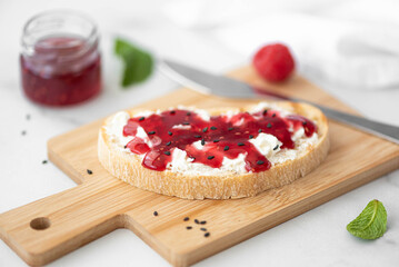 sandwich with raspberry jam and curd cheese