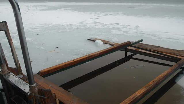 Place for winter swimming. Ice hole.