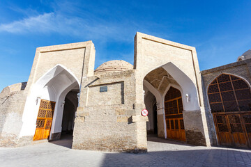 Exterior of the Tok-i-Telpak Furushon one of the city’s four remaining bazaars in Bukhara, Uzbekistan, Central Asia