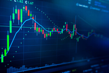 Blue Stock Exchange Market trading graph on screen laptop for  financial investment. Stock analysis chart display. Finance and Economic concept