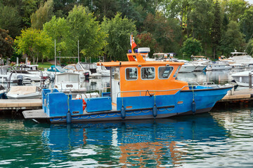 Fototapeta na wymiar pier with boats on Lake Geneva in Yvoire