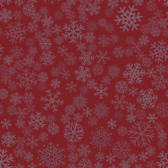 Seamless winter background consisting of snowflakes of different shapes placed chaotically. Snowflakes placed on dark red background. Christmas and new year symbol and mood.
