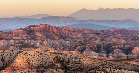 Sunrise over the colorful eroded badlands of the Gorafe desert, los Coloraos, Andalusia, Spain

