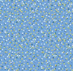 Floral pattern. Pretty flowers on pale blue background. Printing with small white and yellow flowers. Ditsy print. Seamless vector texture. Spring bouquet. Stock vector.