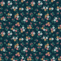 Cute floral pattern in the small flower. Seamless vector texture. Elegant template for fashion prints. Printing with small white, yellow and pink flowers. Navy blue background. Stock print.