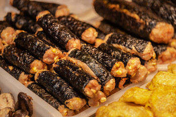 Laver meatloaf made of laver, pork and corn. Delicious chinese cuisine sold in the store.