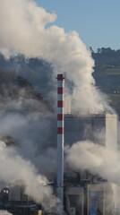 Fumes and pollution in factory chimneys