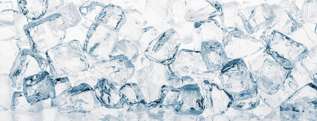 Ice cubes heap background pattern on white. Pieces of crushed ice cubes on white background.