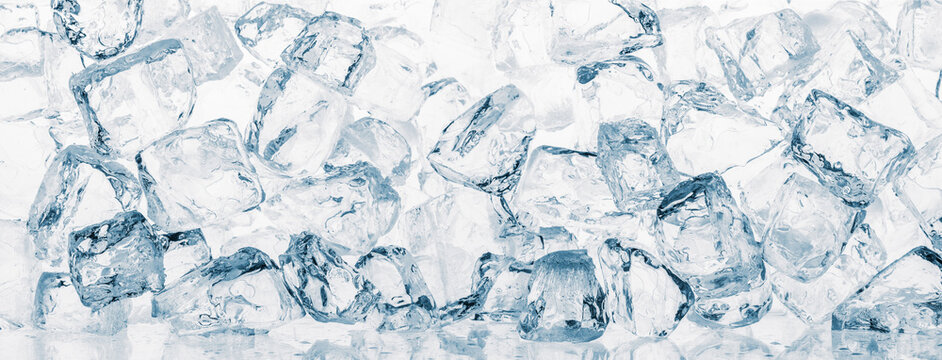Ice cubes heap background pattern on white. Pieces of crushed ice cubes on white background.