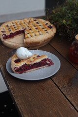 Apple pie cake with cherry with tea in plate dessert menu background 