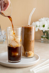 Iced coffee in glass. Cold refreshment iced coffee summer drink.