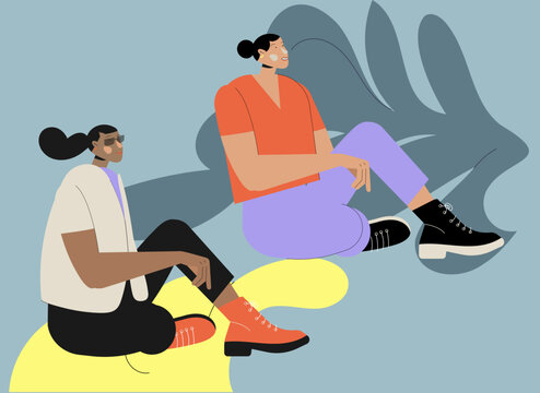 Ilustraci&oacute;n de vectores de dos amigas sentadas en el jard&iacute;n piso platicando y disfrutando