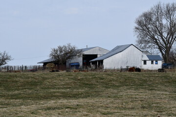 Fototapeta na wymiar Barns in a Farm Field