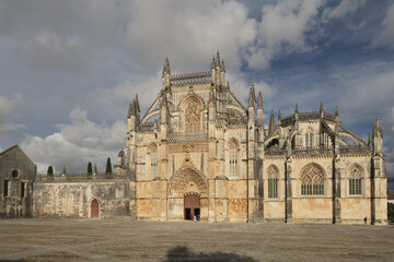 Fototapeta na wymiar the Facade of the Main Entrance at the Batalha Monastery, or Monastery of Santa Maria da Vitoria, Portugal