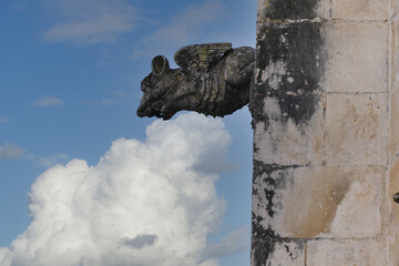 gargoyle on the façade of the Batalha Monastery in Batalha, Portugal	