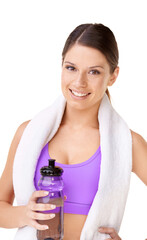 Staying hydrated equals staying healthy. Studio portrait of a sporty young woman with a towel...