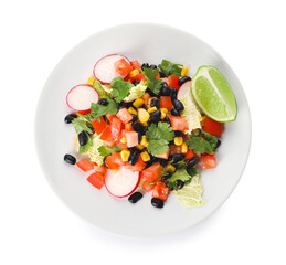Plate of tasty Mexican vegetable salad with black beans and radish isolated on white background
