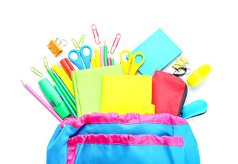 Backpack with stationery on white background, closeup