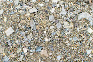 Texture background, pebbles on the beach. Lake Shore. Coastal photo. Sea shore.