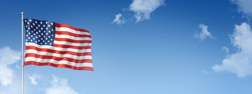 United States flag isolated on a blue sky. Horizontal banner